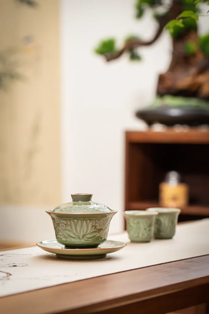 Oriental Lotus Hand-Carved Lidded Bowl 6 YMTEA Oriental Lotus hand-carved celadon-style ceramic tea set