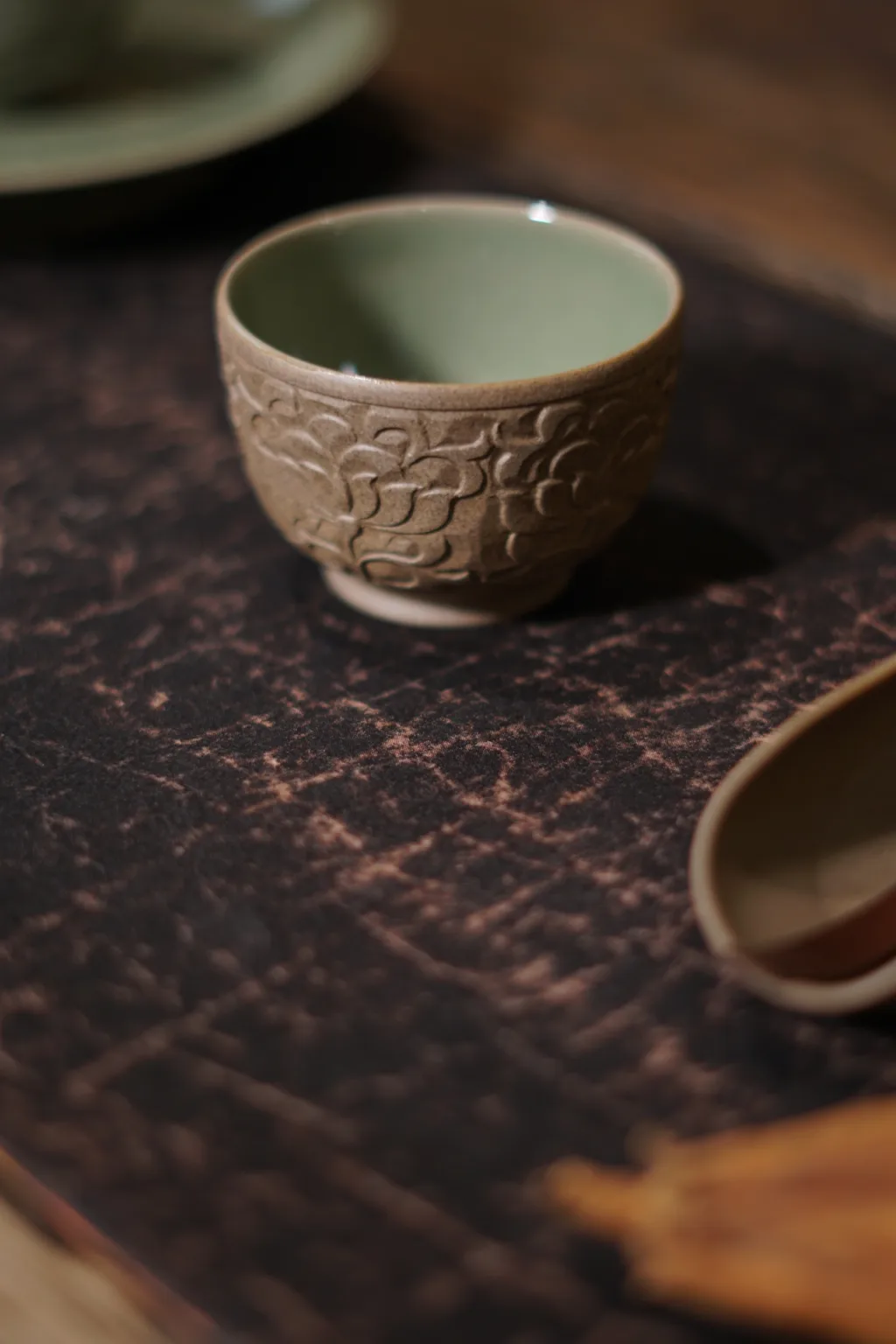 Handmade Peony Tea Cup 5 YMTEA peony pattern Yaozhou Kiln teacup showing its overall shape and ceramic finish