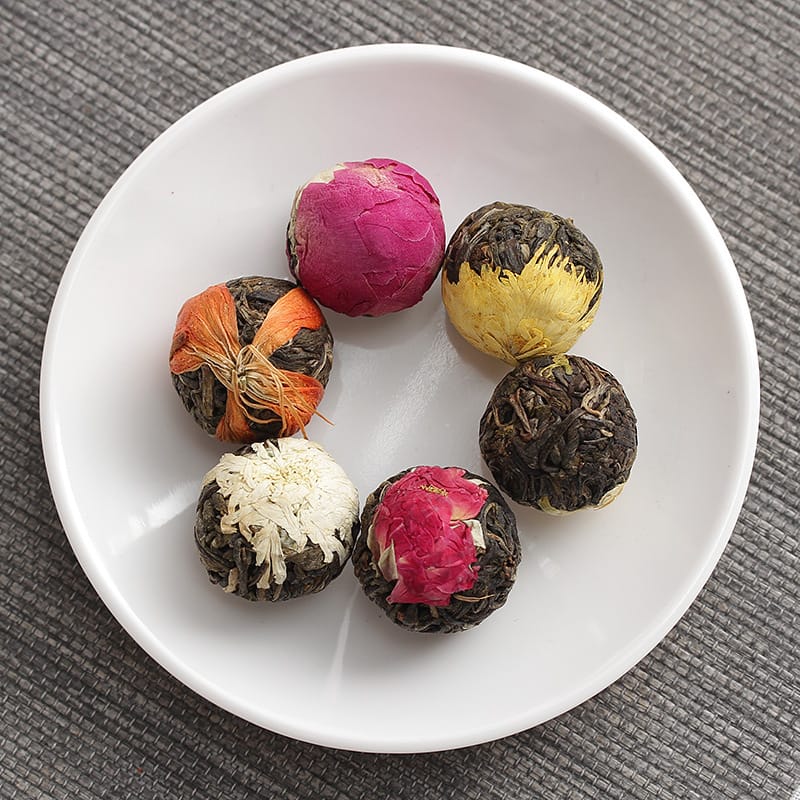 Sourcing Bulk Jasmine Tea: How to Ensure Batch-to-Batch Quality Stability? 1 Portable Pu-erh tea dragon pearls with flower infusion, individually wrapped mini tea balls for on-the-go brewing.